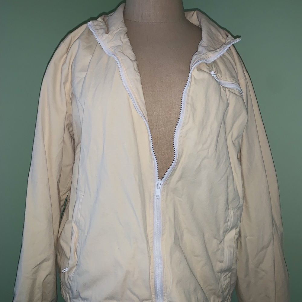 cream-colored canvas zip-up